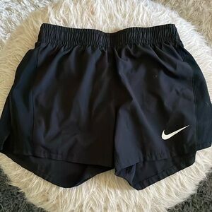 Nike kids medium black shorts and flower spanks